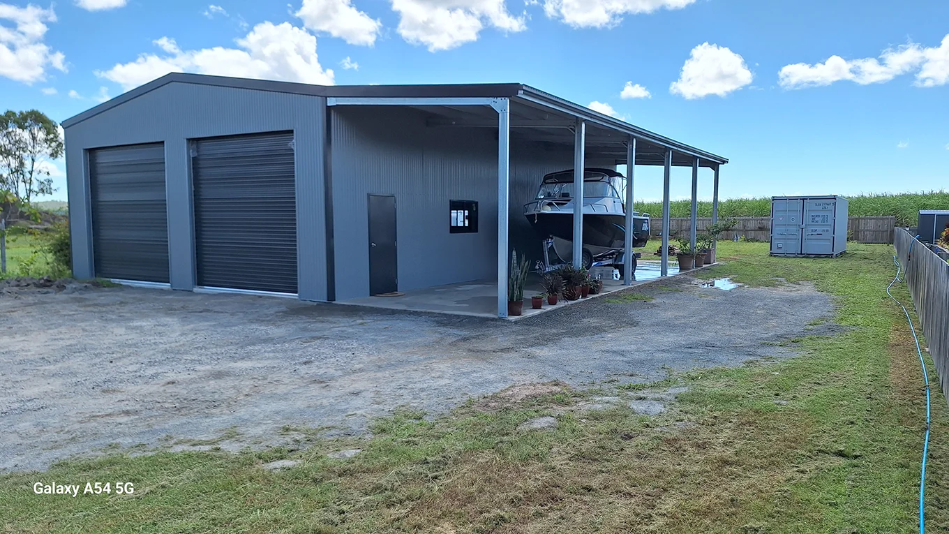 Boat shed and workshop with awning and mezzanine.