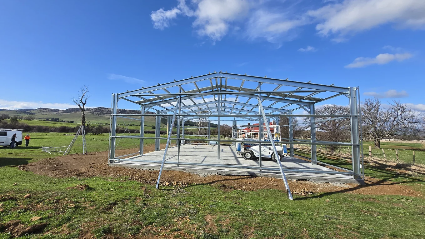 Machinery shed side frame during construction.