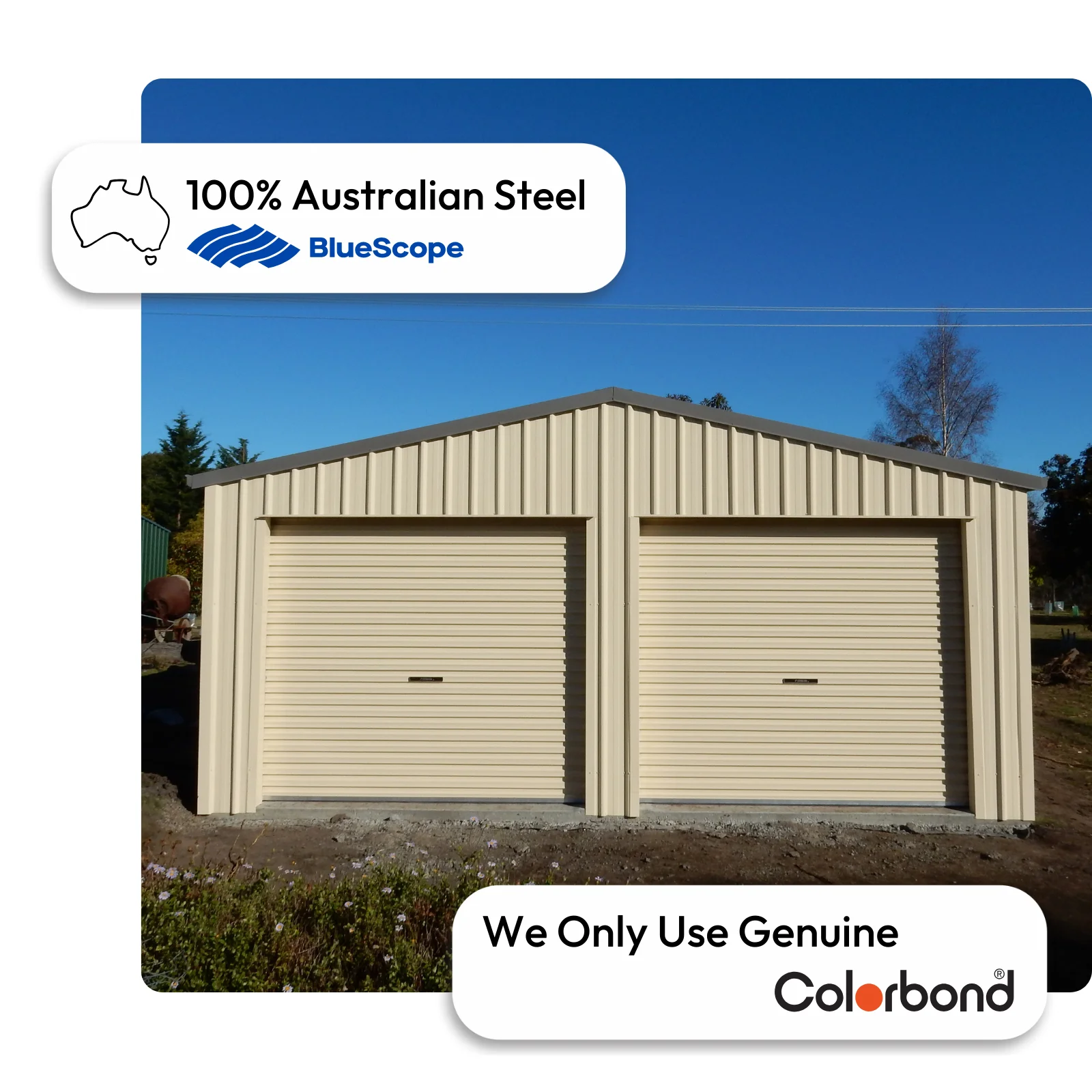 Australian-made car shed with double roller doors featuring Classic Cream™ walls and a Woodland Grey® roof.