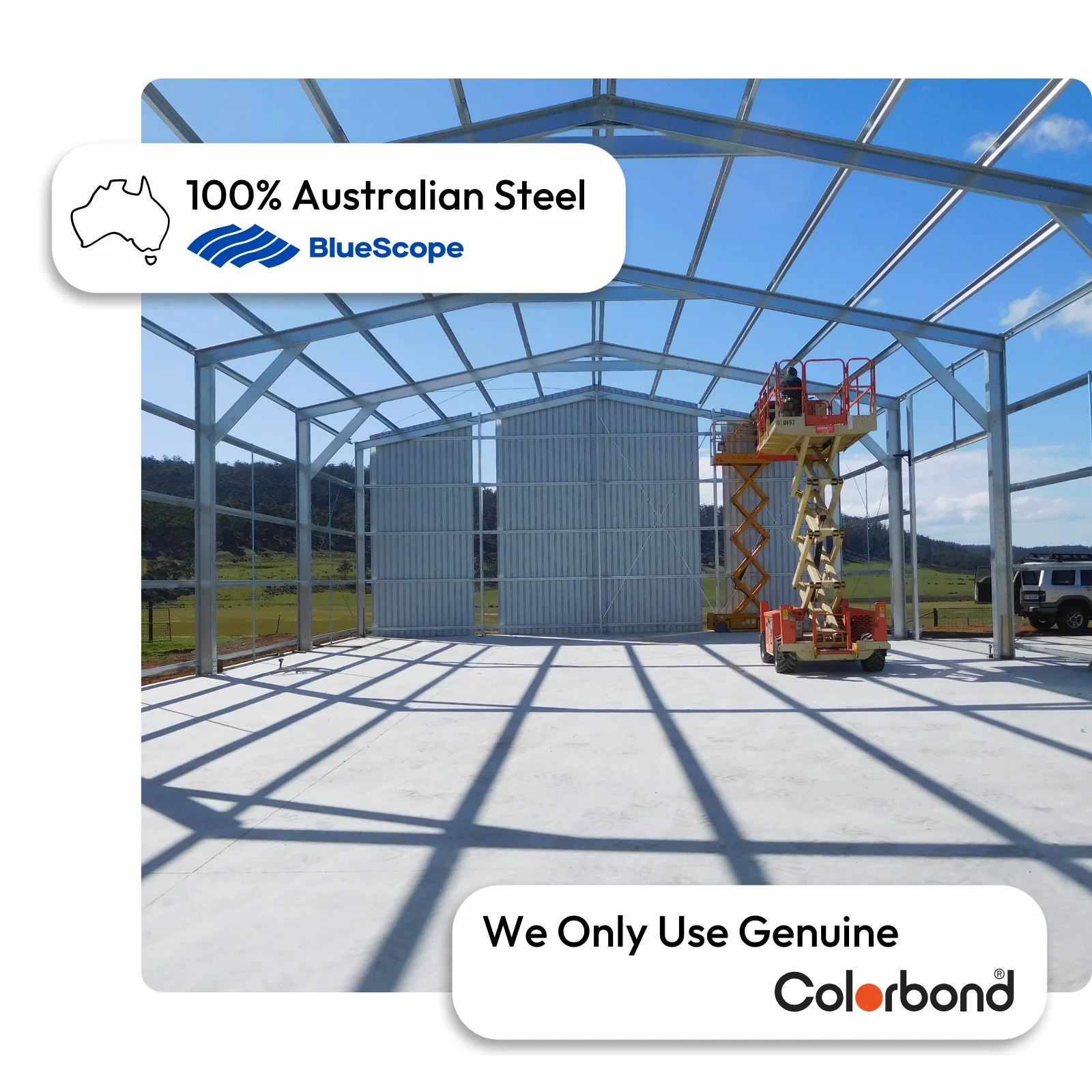 Australian-made shed with a gable roof and large sliding doors featuring ZINCALUME® walls and roof.