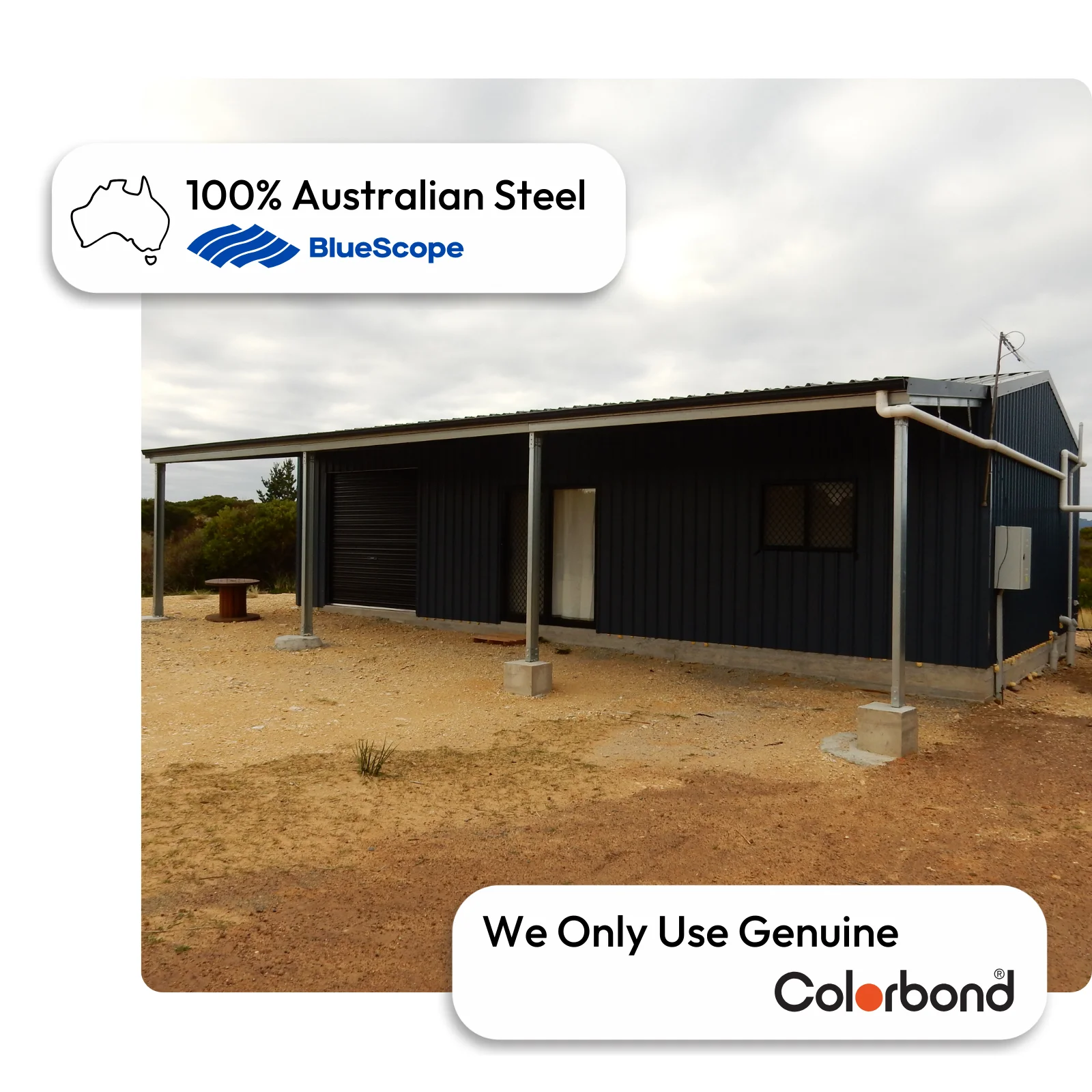 Australian-made shouse with gable roof, verandah, and roller door featuring Night Sky® walls and Surfmist® trim