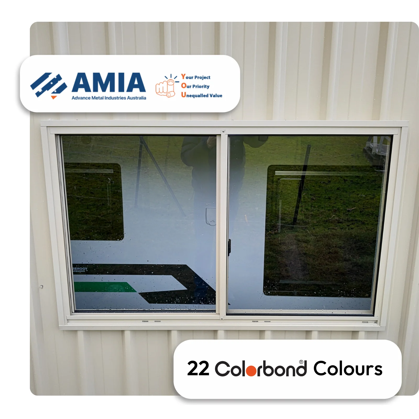 AMIA aluminium sliding window installed in Colorbond cream shed with black and green flooring visible through glass