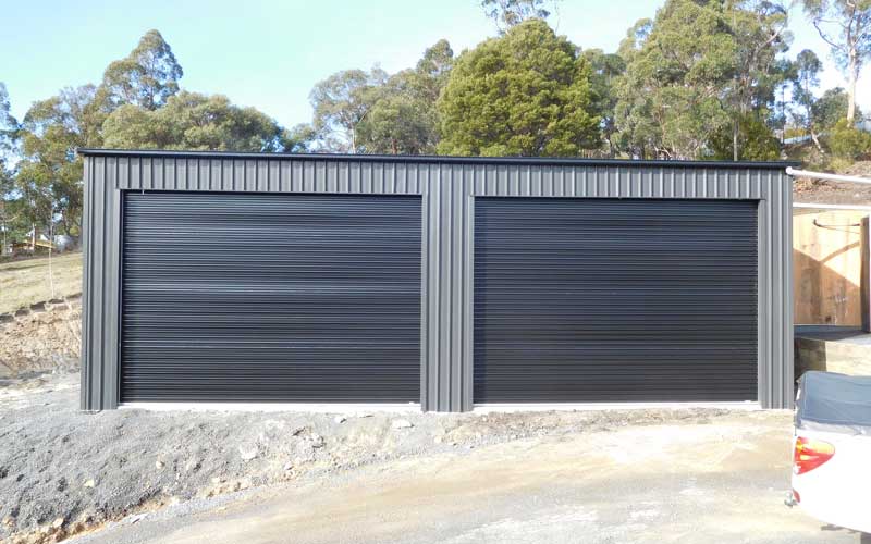 Colorbond Monument shed with 2 roller doors.l