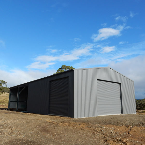 Large Colorbond Shed with 2 roller doors and 2 open bays